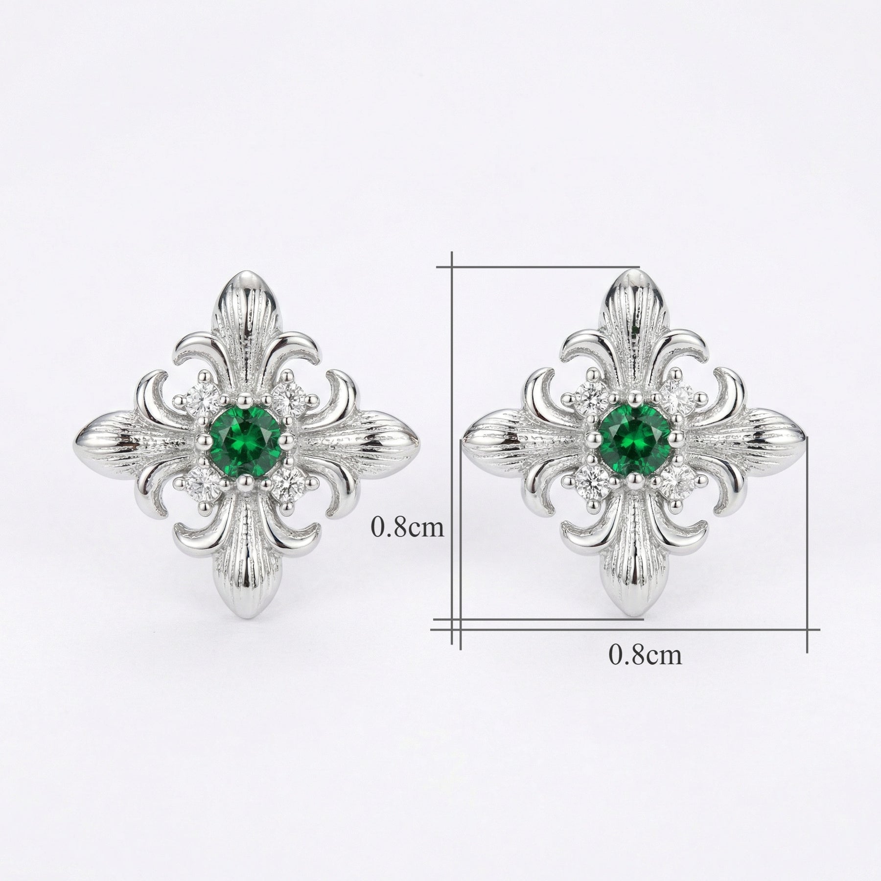 Vintage Fleur-de-Lis Emerald Studs – emerald earrings, close-up