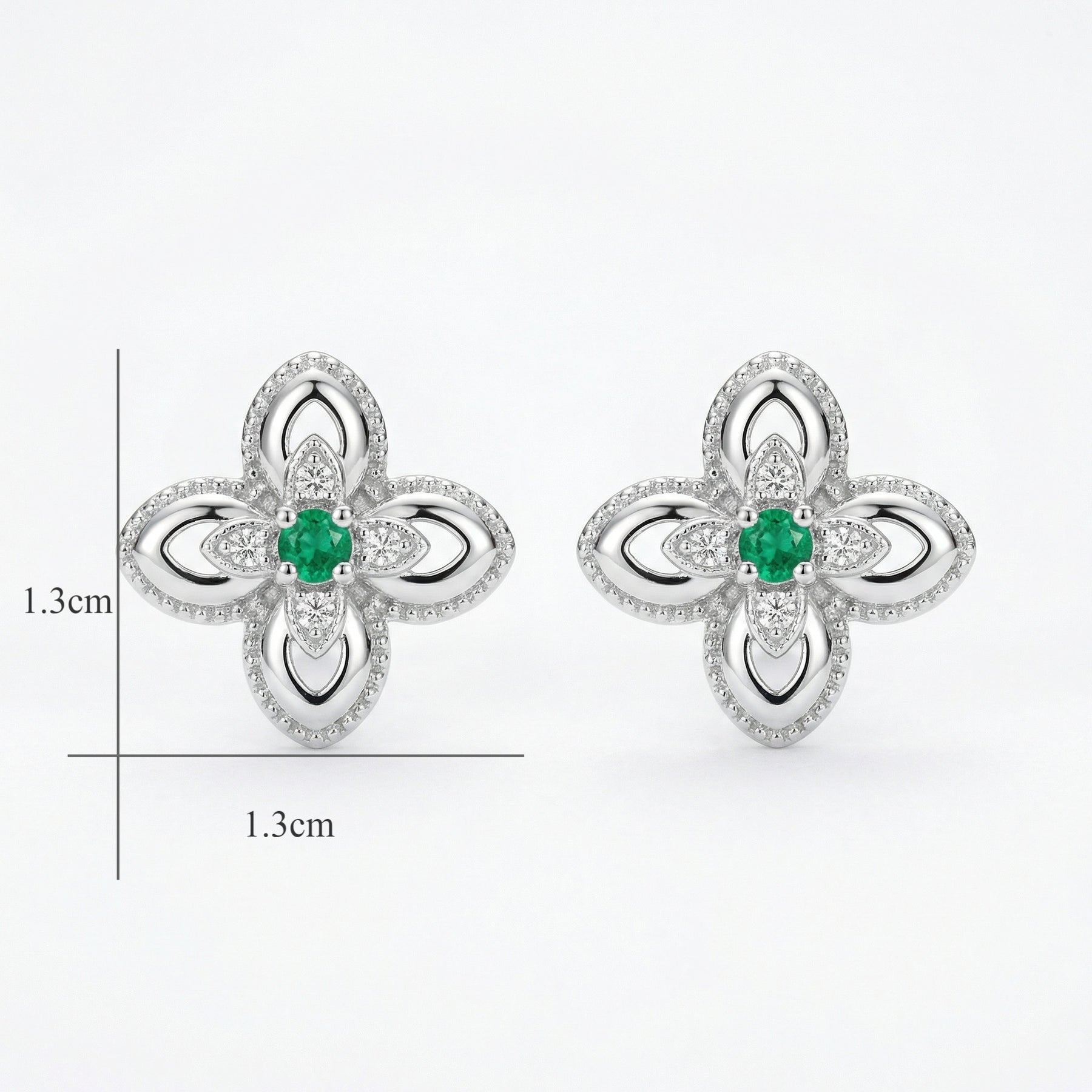 Emerald Floral Studs, Milgrain Detail – emerald earrings, close-up