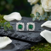 Square Emerald Interlocking Halo Studs – emerald earrings, front view