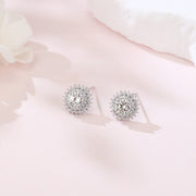 Silver Floral Studs with Moissanite Center – moissanite earrings, front view