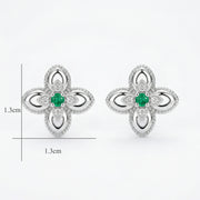 Emerald Floral Studs, Milgrain Detail – emerald earrings, close-up