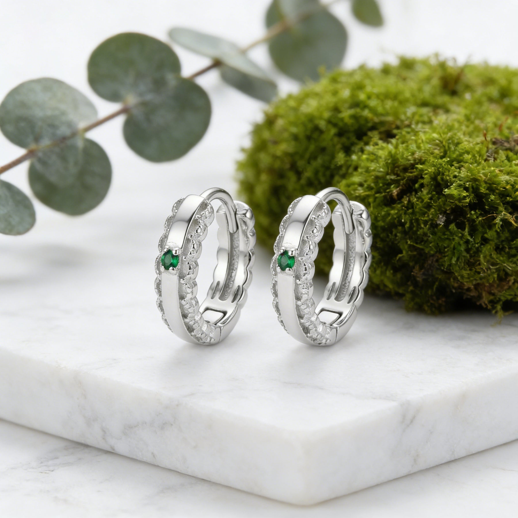 Green Emerald Huggie Hoop Earrings – emerald earrings, close-up