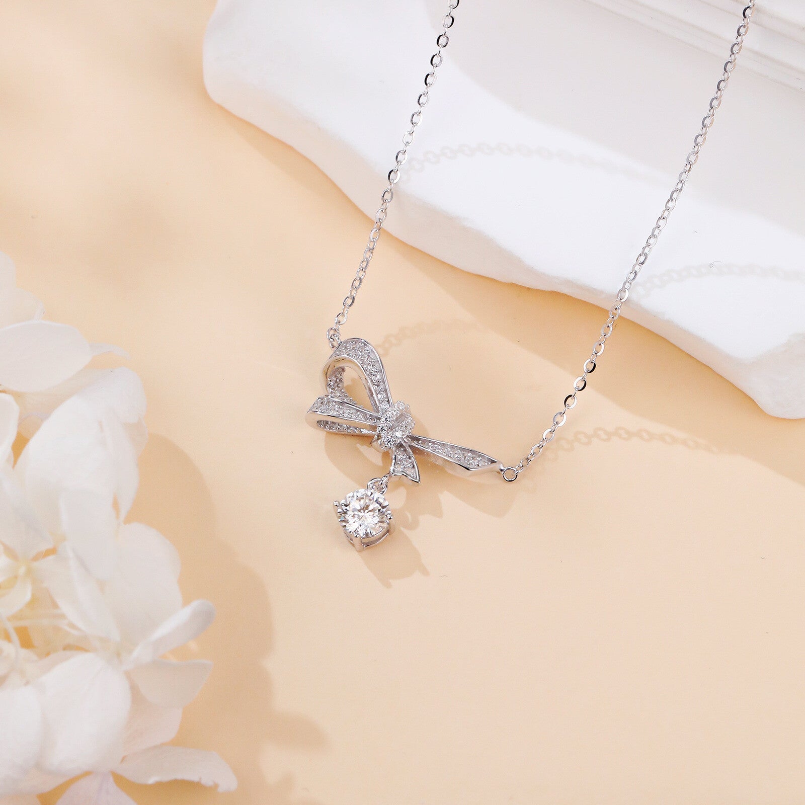 Silver Bow Necklace with Moissanite Charm – moissanite necklace, side detail